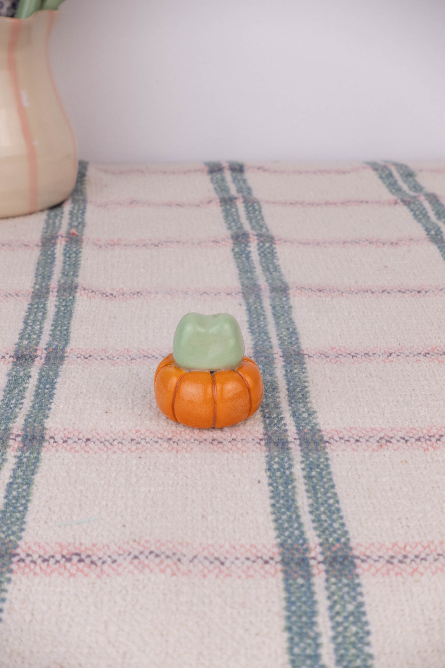 Tiny Frog on a Pumpkin