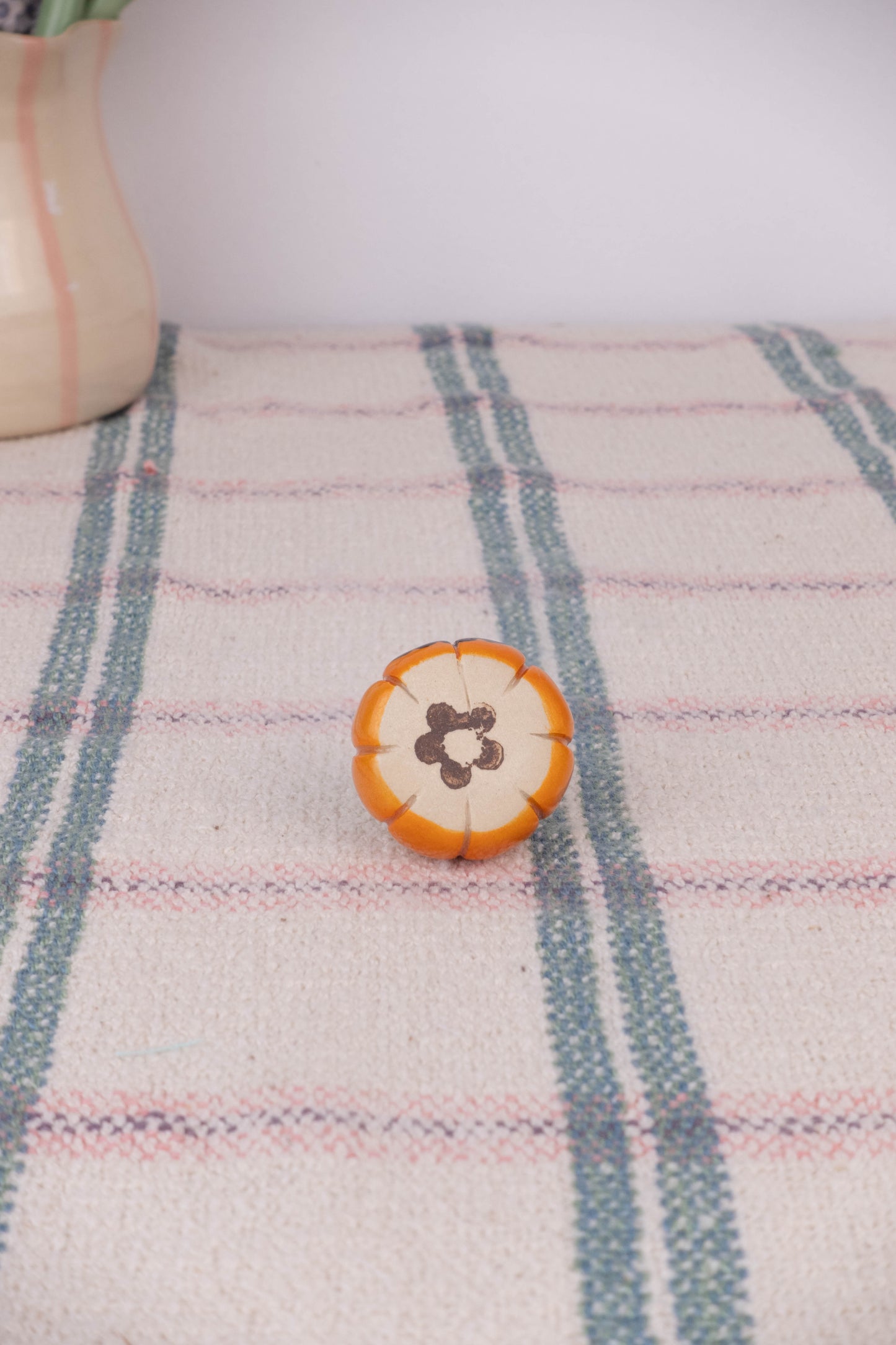 Tiny Frog on a Pumpkin