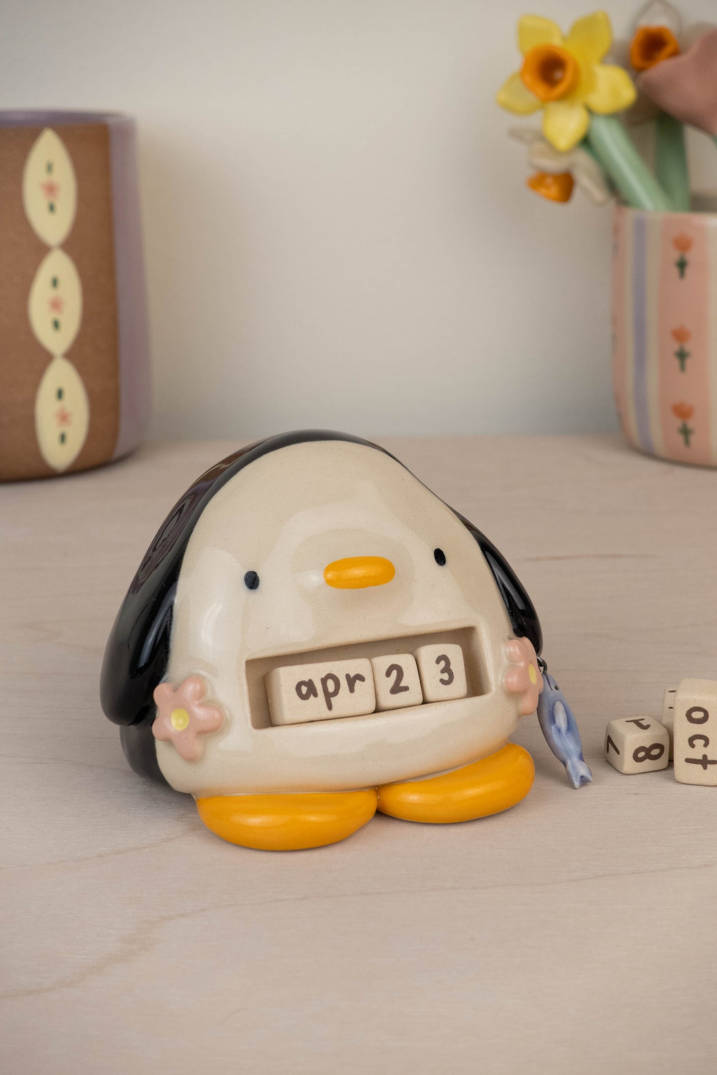 Penguin Calendar with Fishy Charm