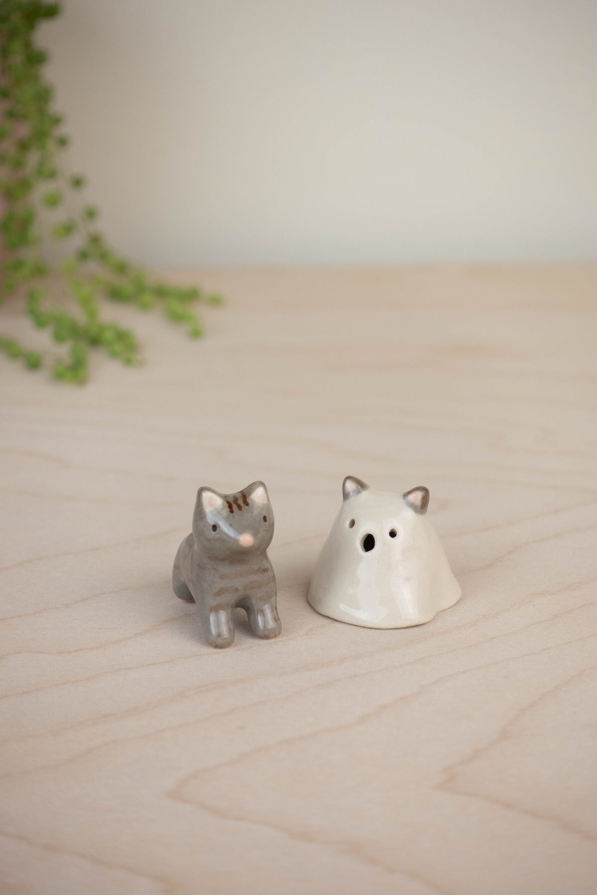 Mini Cat in a Ghost Costume