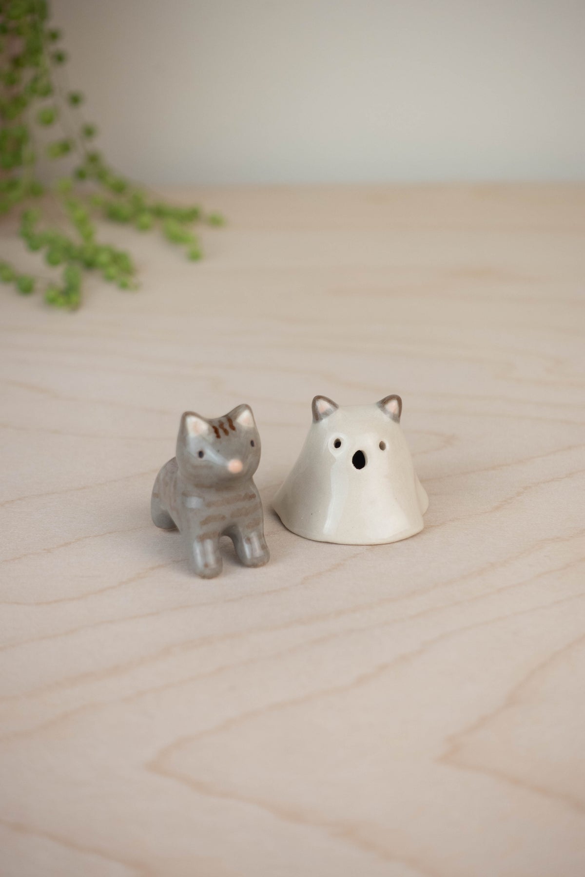 Mini Cat in a Ghost Costume
